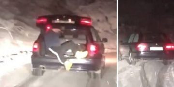 Vetura BMW fillon të rrëshqasë në rrugën me borë, kështu që futën një burrë në bagazh