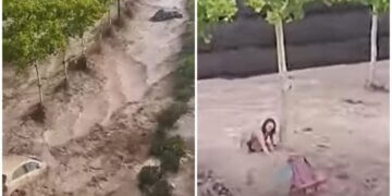 Veturat duke i marrë uji një pas një, gruaja e ngujuar në çatinë e makinës – pamje të rënda nga përmbytjet në Spanjë